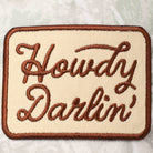 Howdy Darlin' Embroidery Patch Camo Trucker Hat - Cowhide and Conchos