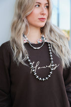 Howdy Embroidered Sweatshirt - Cowhide and Conchos
