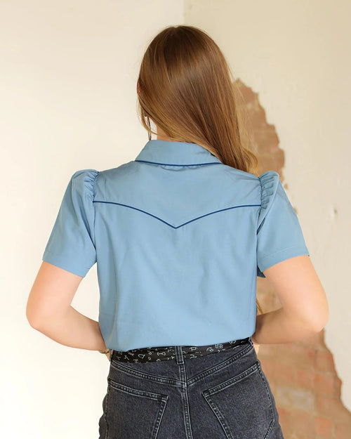Howdy Hanny Women's Light Blue Short Sleeve Pearl Snap Shirt - Cowhide and Conchos