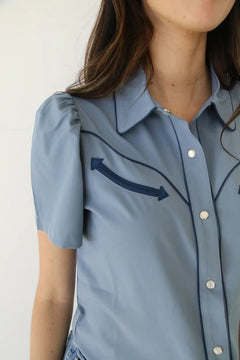 Howdy Hanny Women's Light Blue Short Sleeve Pearl Snap Shirt - Cowhide and Conchos