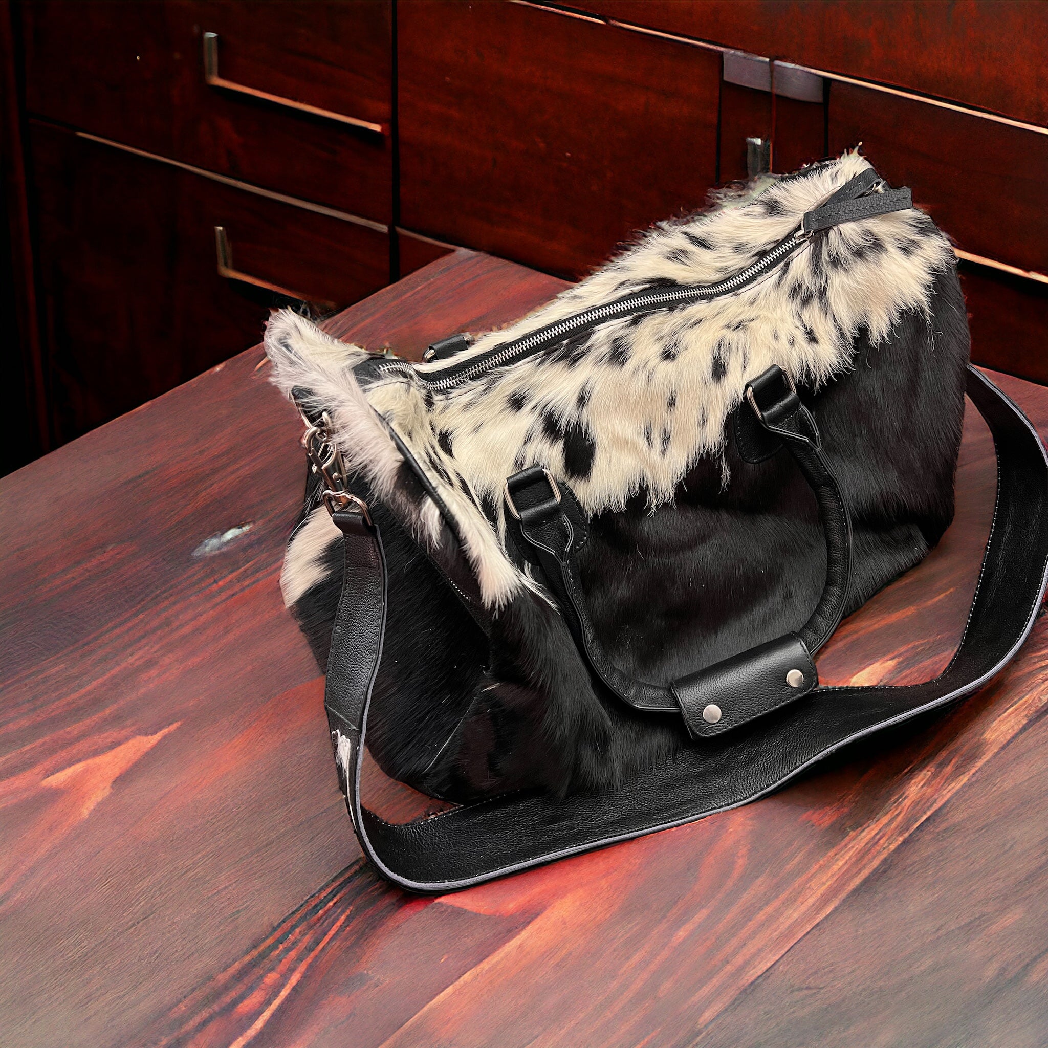 Cowhide duffle bag sale