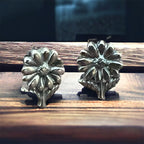 Flower post earrings in sterling silver