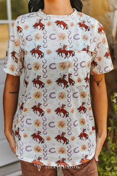 Ivory Cowboy & Horseshoe Printed Short Sleeve Front Pocket Tee - Cowhide and Conchos