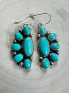 Kathleen Livingston Navajo Sterling Silver Earrings with Sonoran Gem Turquoise — 2" × 3/4" (Hallmarked) - Cowhide and Conchos
