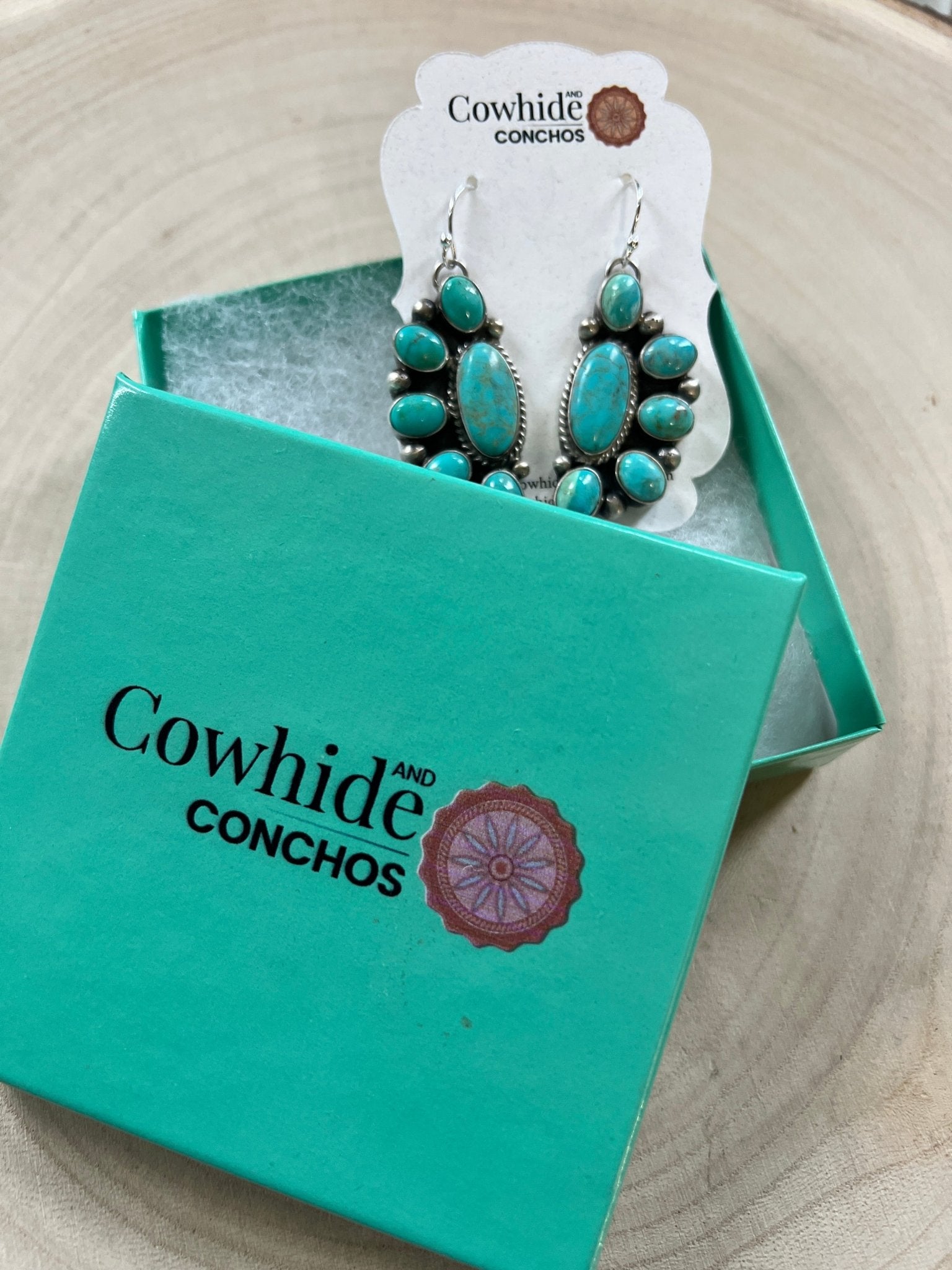 Kathleen Livingston Navajo Sterling Silver Earrings with Sonoran Gem Turquoise — 2" × 3/4" (Hallmarked) - Cowhide and Conchos