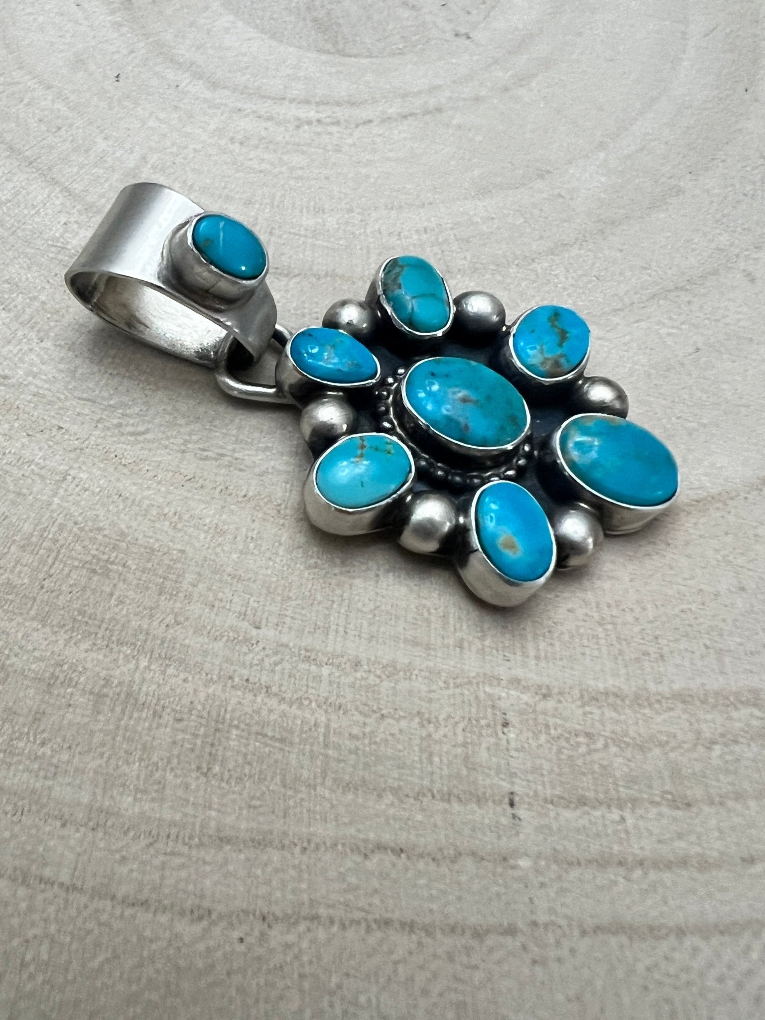 Kathleen Livingston Navajo Sterling Silver Pendant with Sonoran Gem Turquoise — 1 3/4" × 7/8" (Hallmark) - Cowhide and Conchos