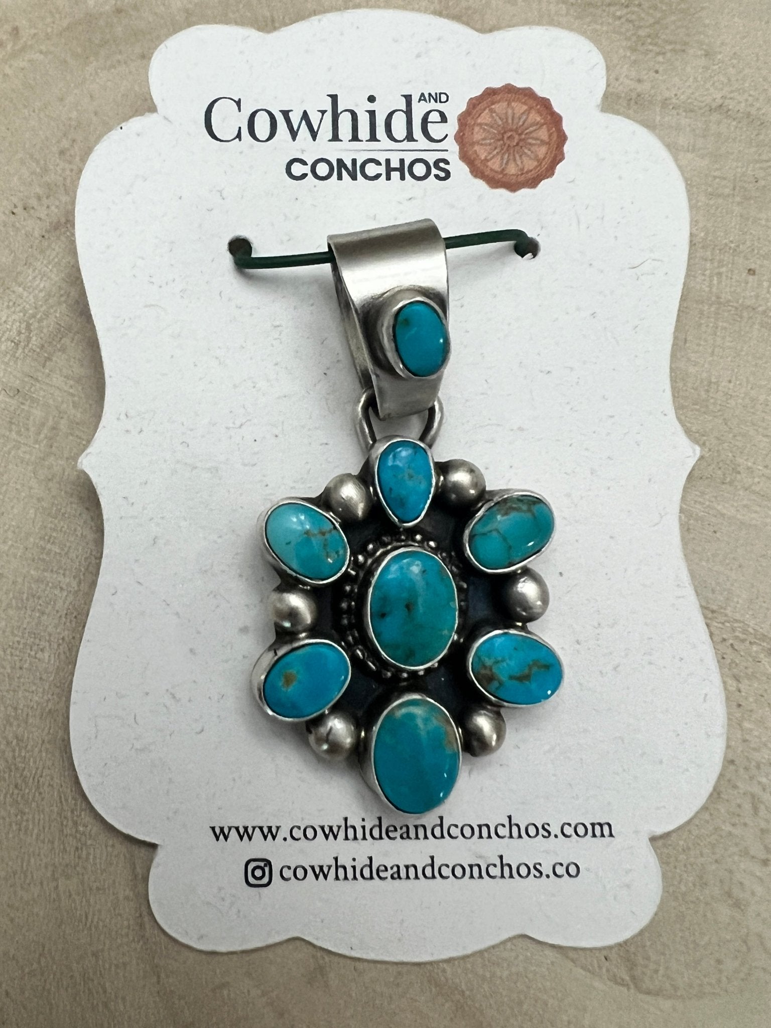 Kathleen Livingston Navajo Sterling Silver Pendant with Sonoran Gem Turquoise — 1 3/4" × 7/8" (Hallmark) - Cowhide and Conchos