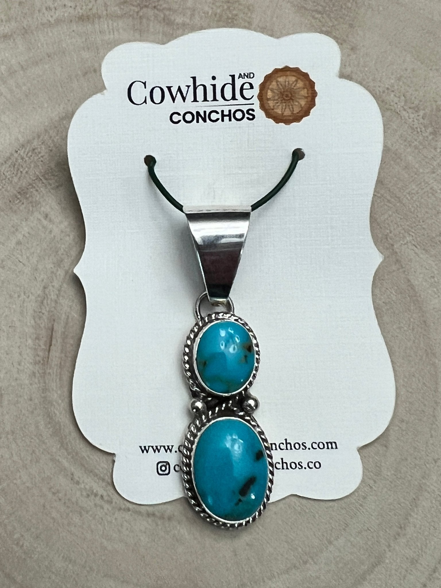 Kathleen Livingston Navajo Sterling Silver Pendant with Sonoran Gem Turquoise — 2" × 1/2" (Hallmarked) - Cowhide and Conchos