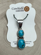 Kathleen Livingston Navajo Sterling Silver Pendant with Sonoran Gem Turquoise — 2" × 1/2" (Hallmarked) - Cowhide and Conchos