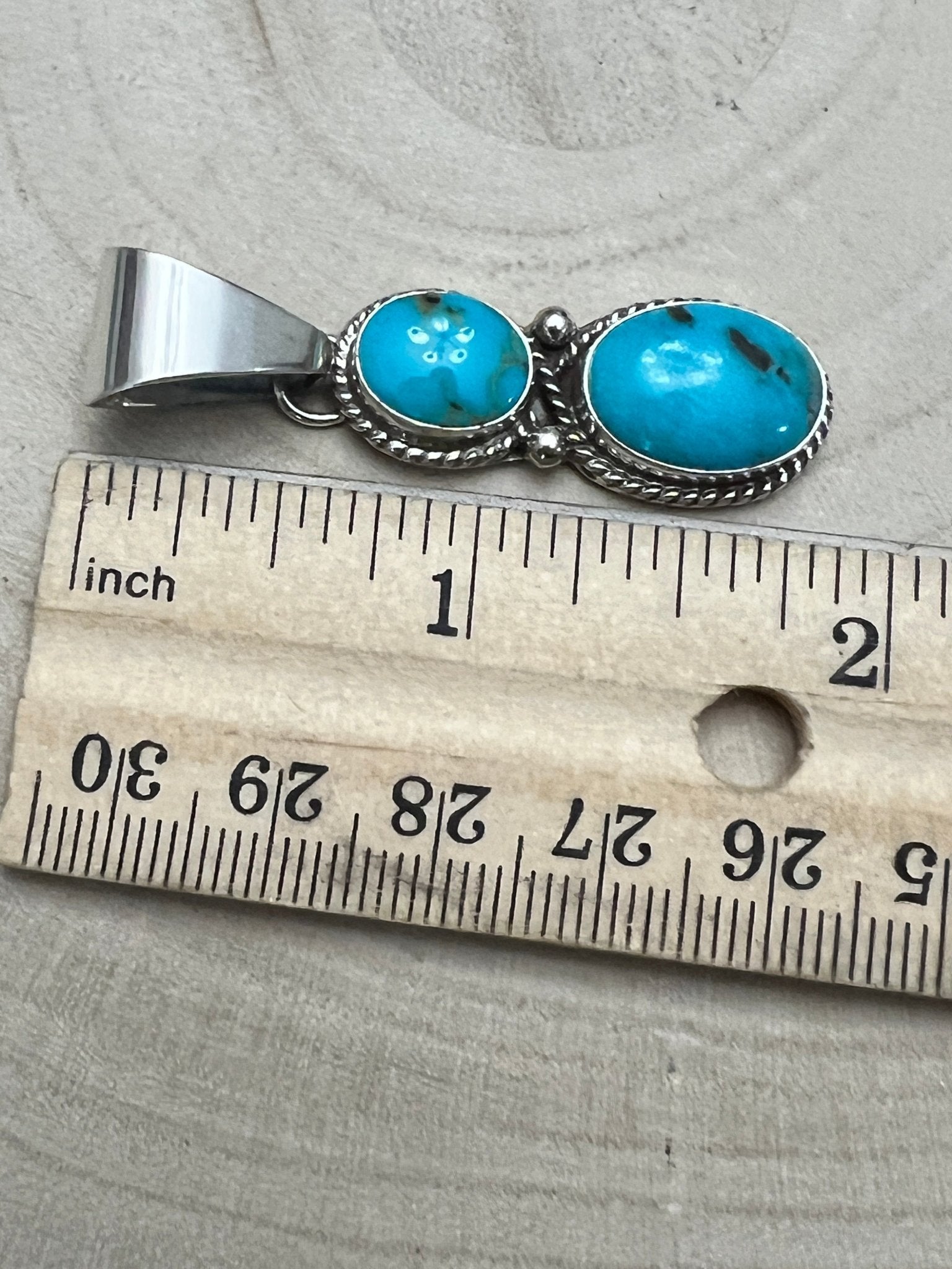 Kathleen Livingston Navajo Sterling Silver Pendant with Sonoran Gem Turquoise — 2" × 1/2" (Hallmarked) - Cowhide and Conchos