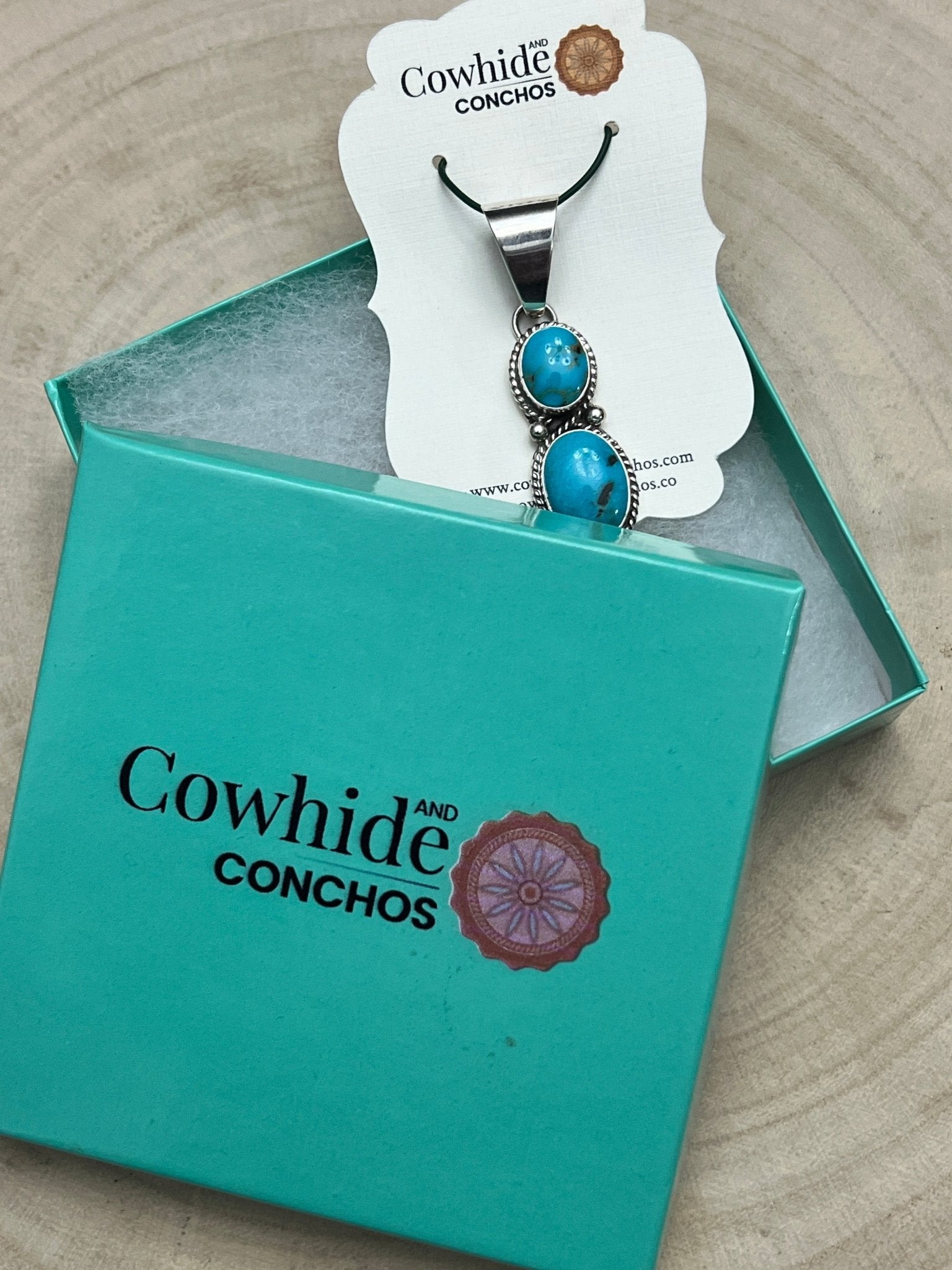 Kathleen Livingston Navajo Sterling Silver Pendant with Sonoran Gem Turquoise — 2" × 1/2" (Hallmarked) - Cowhide and Conchos