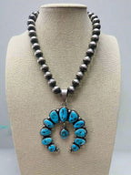 Kathleen Livingston Turquoise & Sterling Silver Naja Pendant - Cowhide and Conchos