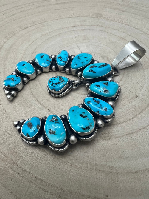 Kathleen Livingston Turquoise & Sterling Silver Naja Pendant - Cowhide and Conchos