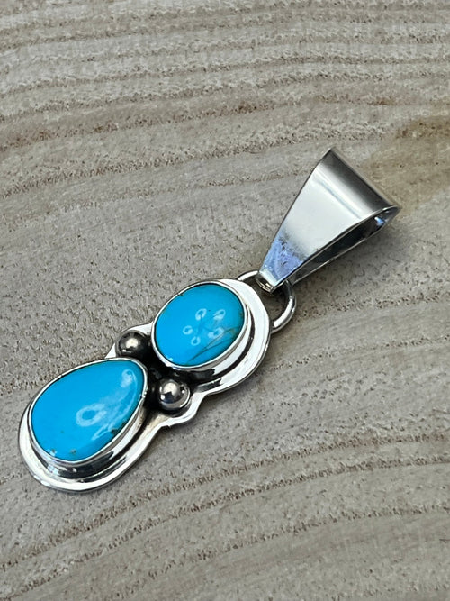 Kathleen Livingston Turquoise & Sterling Silver Pendant - Cowhide and Conchos