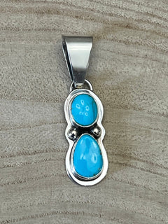 Kathleen Livingston Turquoise & Sterling Silver Pendant - Cowhide and Conchos