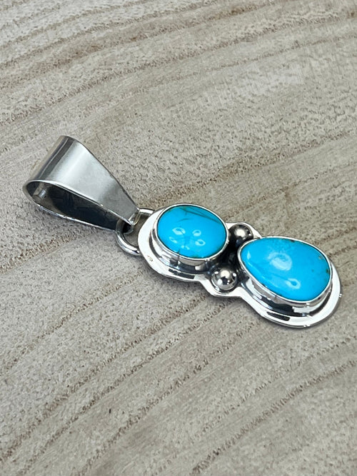 Kathleen Livingston Turquoise & Sterling Silver Pendant - Cowhide and Conchos