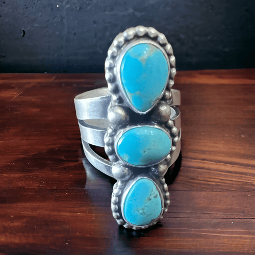 Kathleen Livingston Turquoise & Sterling Silver Ring - Size 7.5 - Cowhide and Conchos