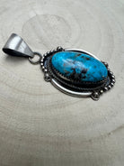 Leslie Nez Navajo Sterling Silver Pendant with Sonoran Rose Turquoise — 2 1/4" × 1" (Hallmarked, Heirloom) - Cowhide and Conchos