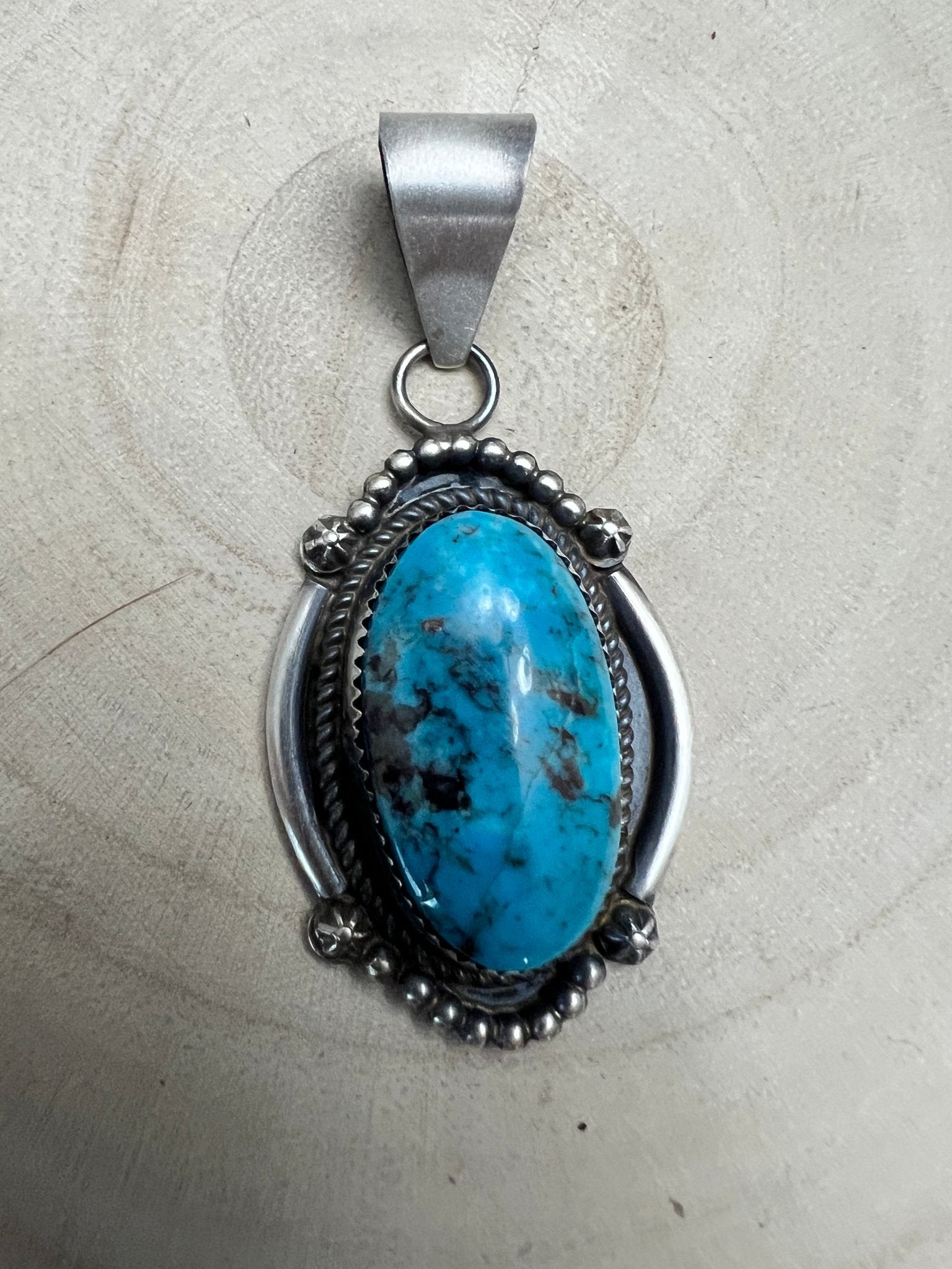 Leslie Nez Navajo Sterling Silver Pendant with Sonoran Rose Turquoise — 2 1/4" × 1" (Hallmarked, Heirloom) - Cowhide and Conchos