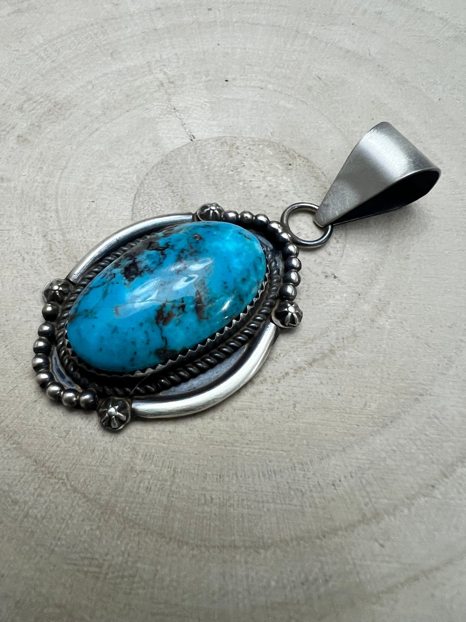Leslie Nez Navajo Sterling Silver Pendant with Sonoran Rose Turquoise — 2 1/4" × 1" (Hallmarked, Heirloom) - Cowhide and Conchos