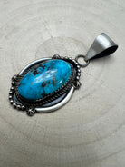 Leslie Nez Navajo Sterling Silver Pendant with Sonoran Rose Turquoise — 2 1/4" × 1" (Hallmarked, Heirloom) - Cowhide and Conchos