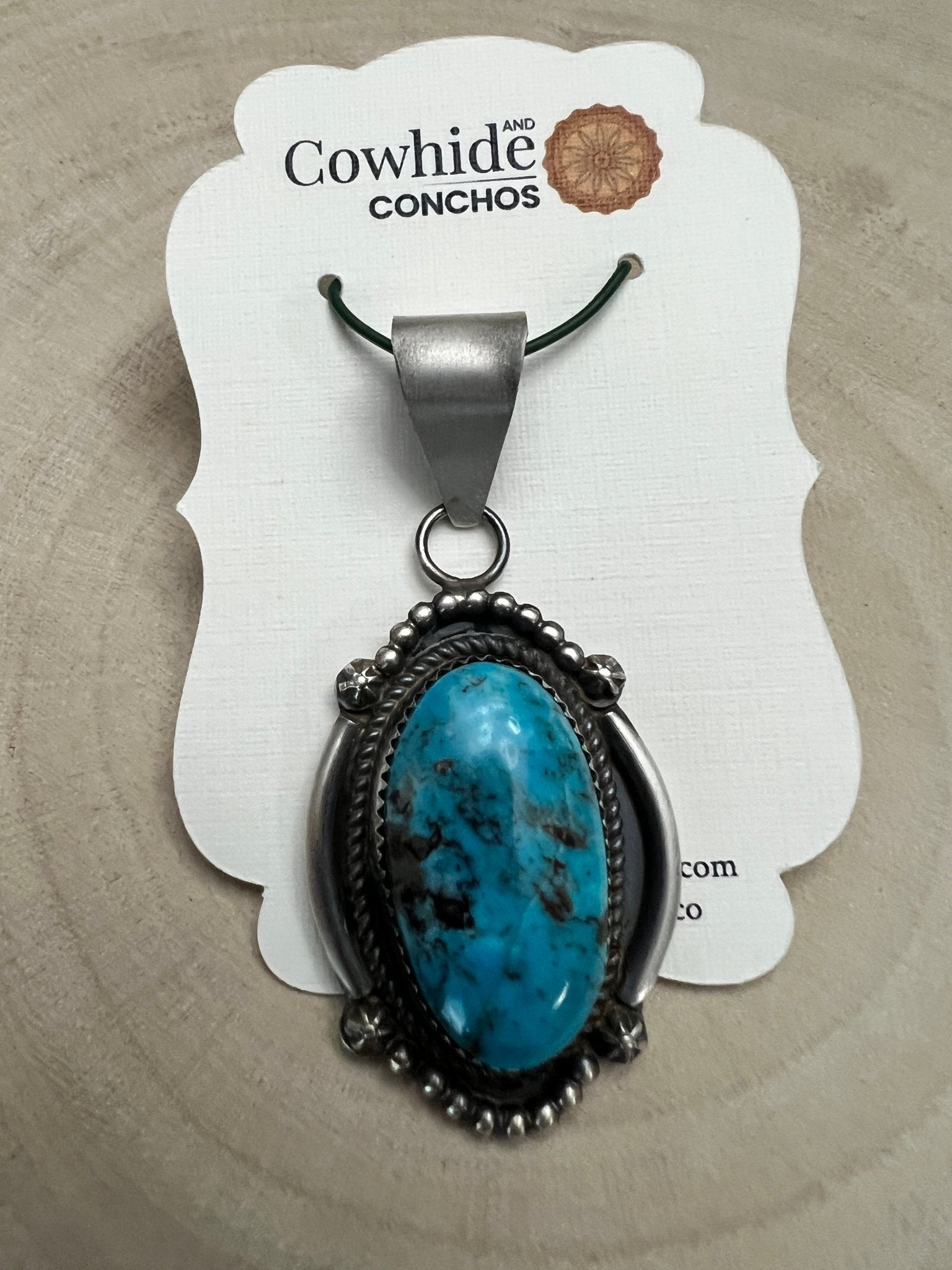 Leslie Nez Navajo Sterling Silver Pendant with Sonoran Rose Turquoise — 2 1/4" × 1" (Hallmarked, Heirloom) - Cowhide and Conchos