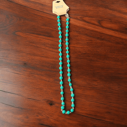Marble Falls Necklace - 26 inch - Cowhide and Conchos
