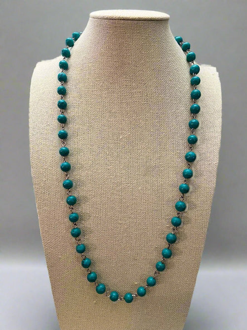 Marble Falls Necklace - 26 inch - Cowhide and Conchos