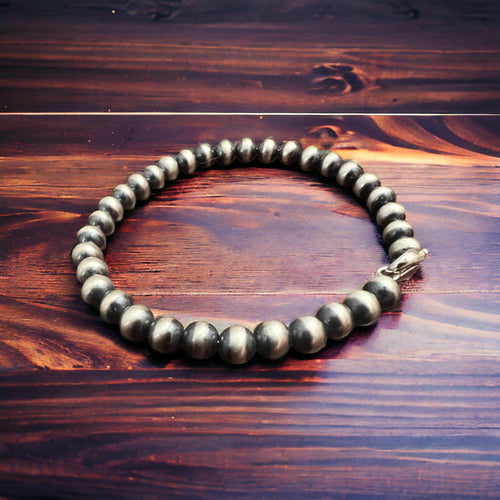 Memory Wire Sterling Pearl Bracelet - Cowhide and Conchos