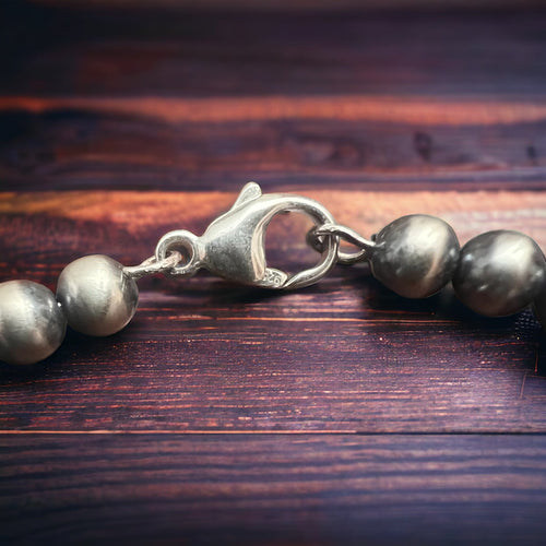Memory Wire Sterling Pearl Bracelet - Cowhide and Conchos
