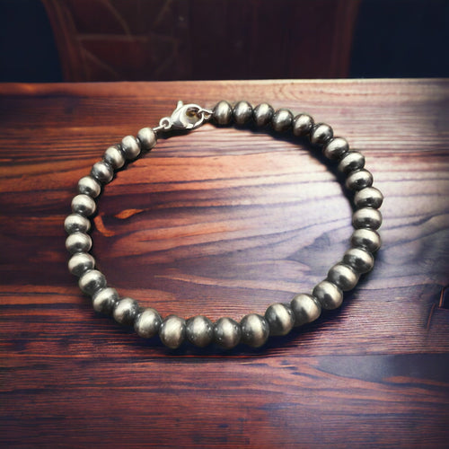 Memory Wire Sterling Pearl Bracelet - Cowhide and Conchos