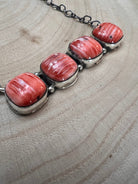 Navajo Handmade Spiny Oyster Necklace by Tia Long - 18 inch - Cowhide and Conchos
