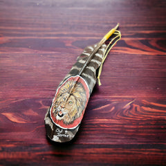 Painted hat feather by Chad Demien - Lion - Cowhide and Conchos