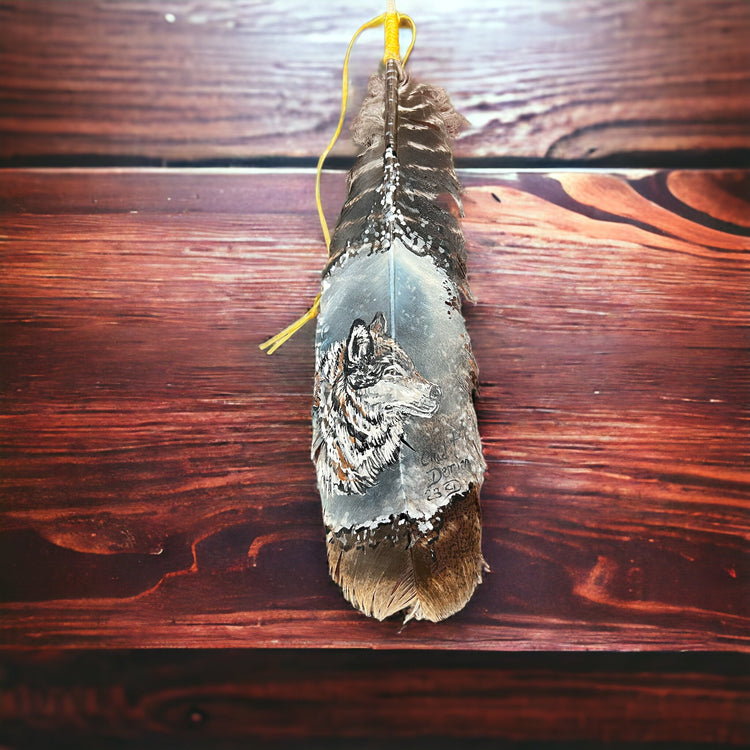 Painted hat feather by Chad Demien - Wolf  Cowhide and Conchos