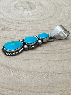 Paul Livingston Turquoise & Sterling Silver Pendant - Cowhide and Conchos