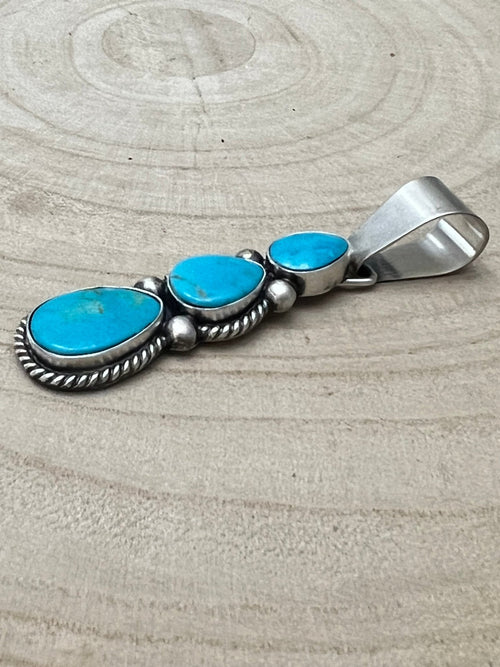 Paul Livingston Turquoise & Sterling Silver Pendant - Cowhide and Conchos
