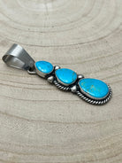 Paul Livingston Turquoise & Sterling Silver Pendant - Cowhide and Conchos
