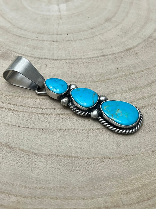 Paul Livingston Turquoise & Sterling Silver Pendant - Cowhide and Conchos