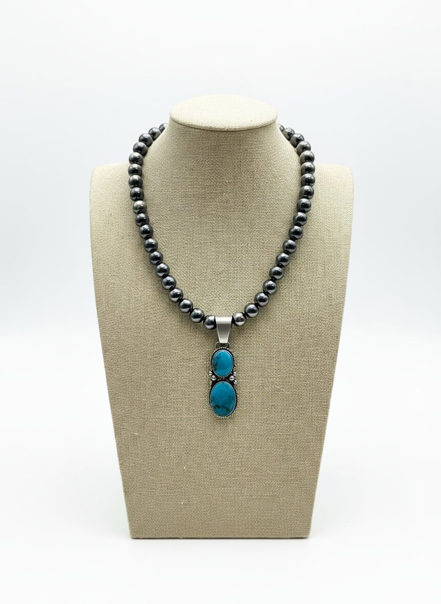 Paul Livingston Turquoise & Sterling Silver Pendant - Cowhide and Conchos