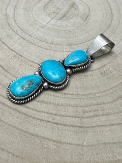 Paul Livingston Turquoise & Sterling Silver Pendant - Cowhide and Conchos