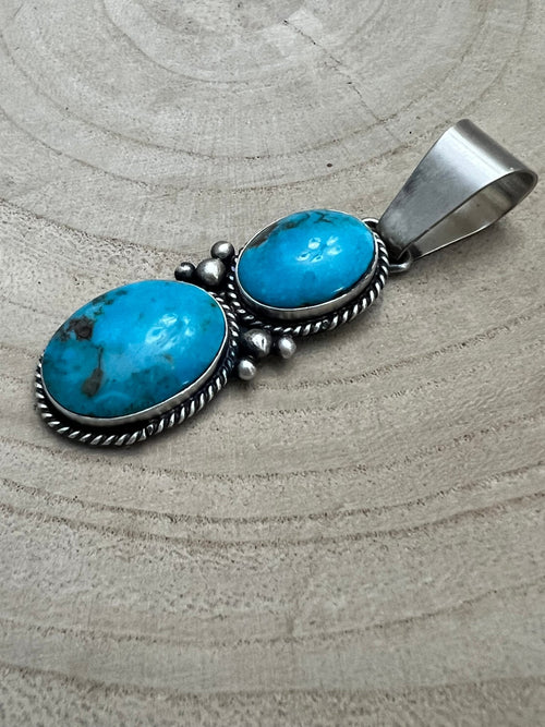 Paul Livingston Turquoise & Sterling Silver Pendant - Cowhide and Conchos