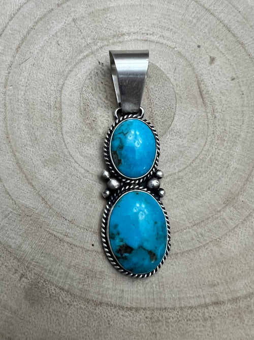 Paul Livingston Turquoise & Sterling Silver Pendant - Cowhide and Conchos