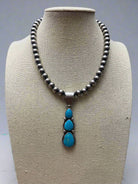 Paul Livingston Turquoise & Sterling Silver Pendant - Cowhide and Conchos