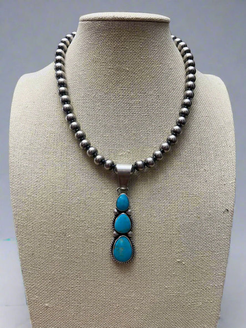 Paul Livingston Turquoise & Sterling Silver Pendant - Cowhide and Conchos