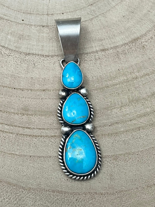 Paul Livingston Turquoise & Sterling Silver Pendant - Cowhide and Conchos