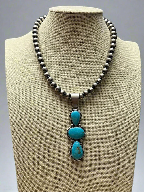 Paul Livingston Turquoise & Sterling Silver Pendant - Cowhide and Conchos