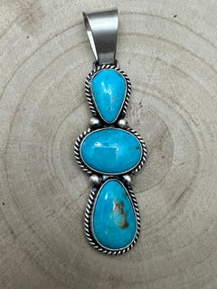 Paul Livingston Turquoise & Sterling Silver Pendant - Cowhide and Conchos