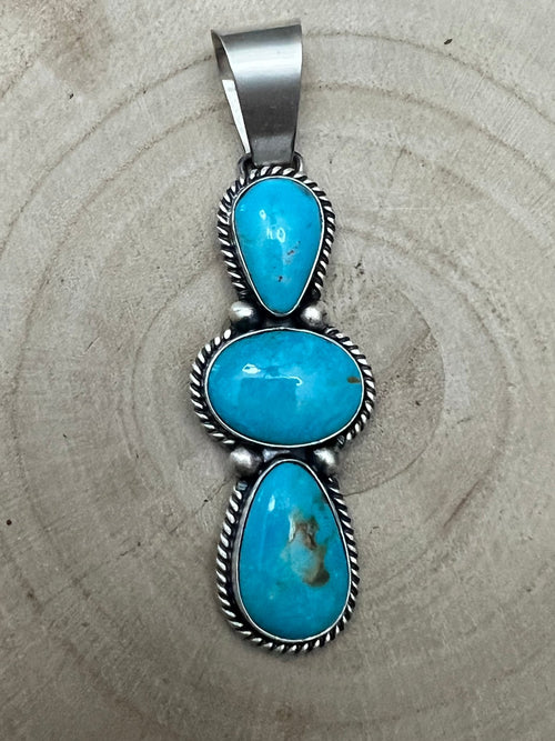 Paul Livingston Turquoise & Sterling Silver Pendant - Cowhide and Conchos
