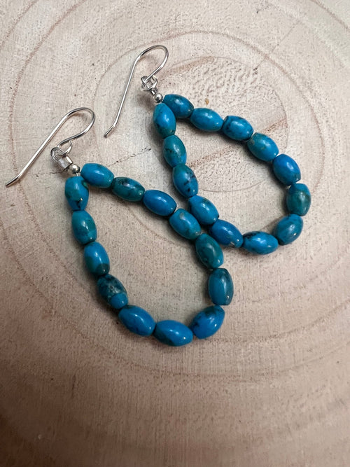 Sterling Silver and Kingman Turquoise Teardrop Earrings - Cowhide and Conchos
