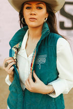 Teal Puffer W Aztec Lining Boot Stitch Detail Vest - Cowhide and Conchos